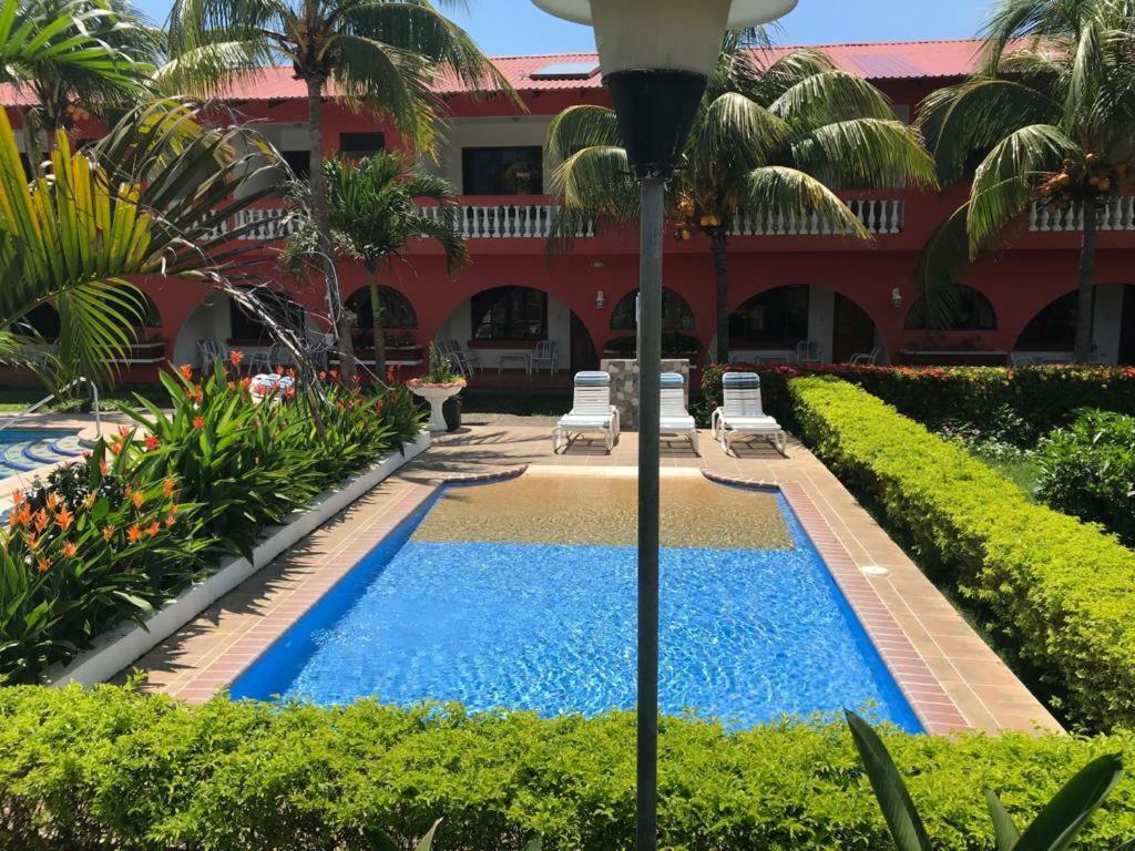 Apartotel Flamboyant Jaco Bagian luar foto